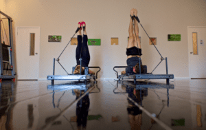 photo of people using Pilates reformers in Melbourne